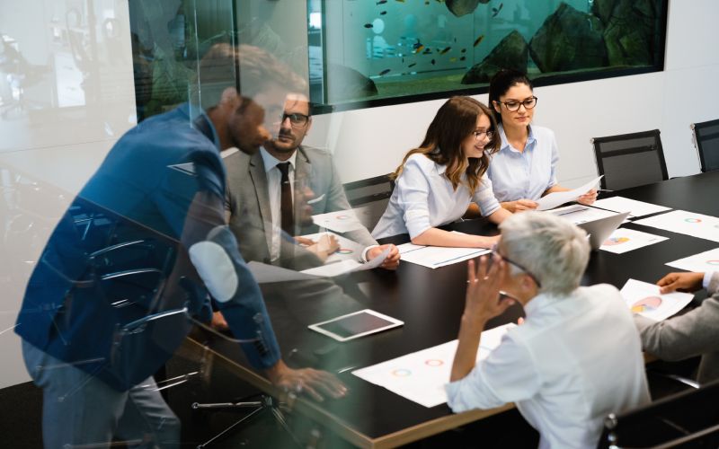 Business team discussing ESG strategy in a corporate meeting